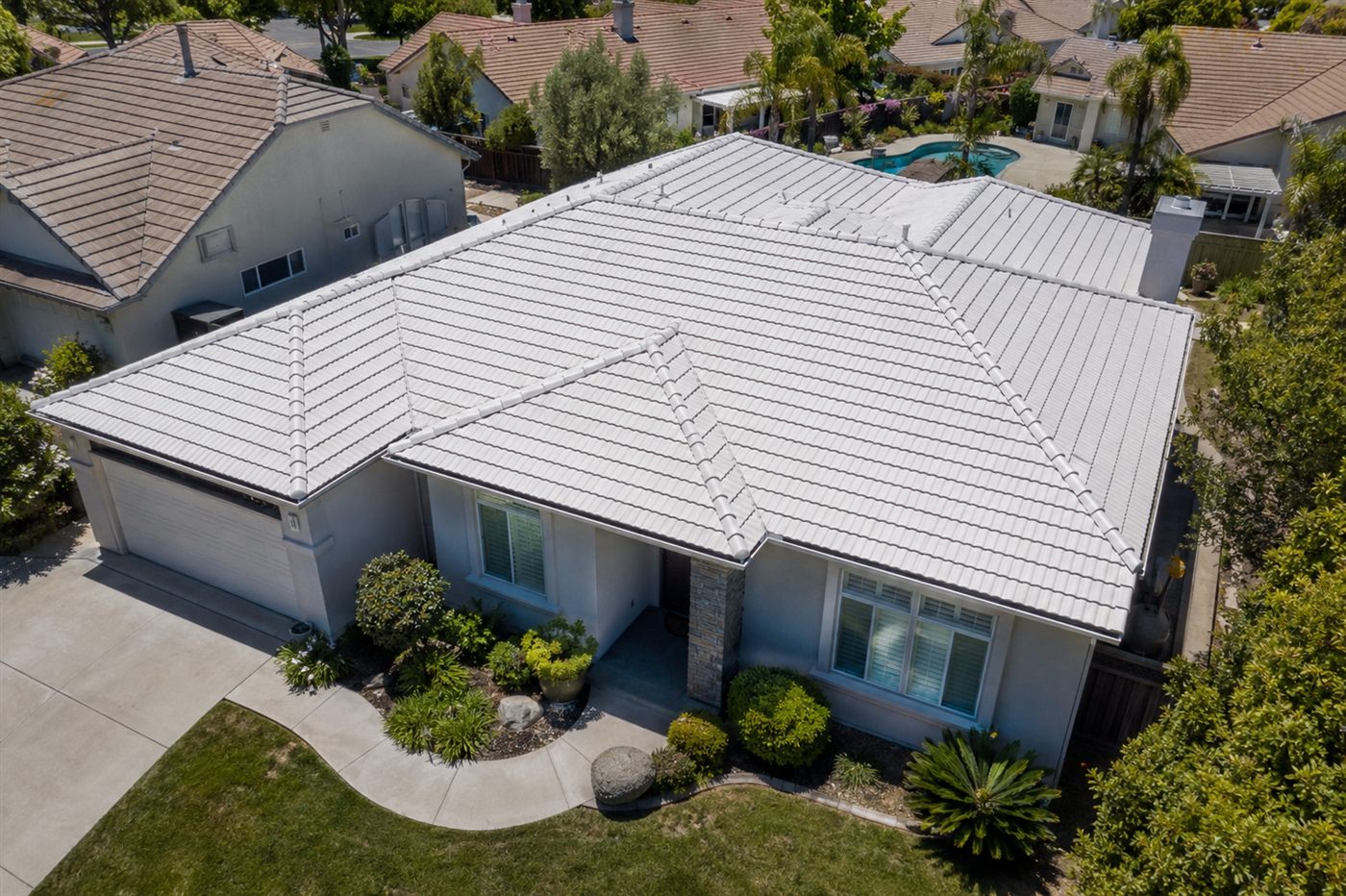 Aerial view of a cool reflective roof on a California home